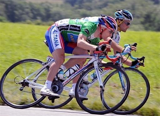 Levi Leipheimer and a teammate descent on stage four.