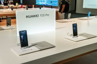 A Huawei smartphone on sale inside a store