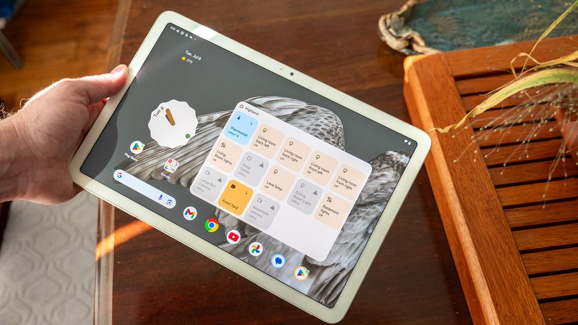 The Google Pixel Tablet with a smart home controls widget on the home screen