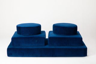 Dark blue cushions of different shapes