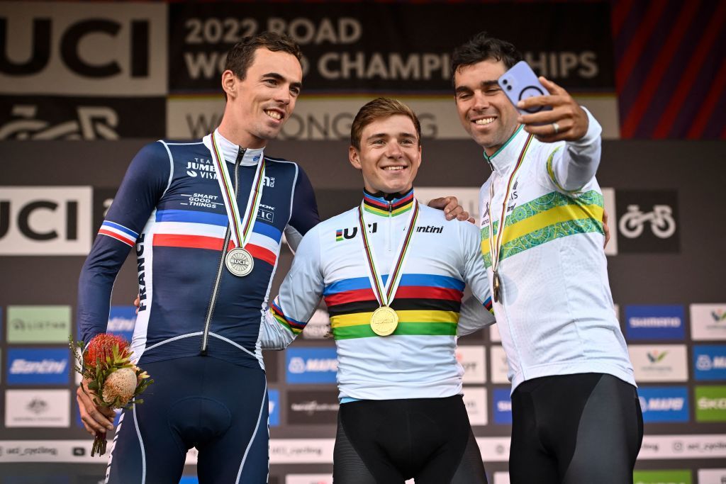 French Christophe Laporte of JumboVisma winner of the silver medal Belgian Remco Evenepoel winner of the gold medal and Australian Michael Matthews BikeExchangeJayco winner of the bronze medal pictured on the podium of the mens elite road race at the UCI Road World Championships Cycling 2022 in Wollongong Australia Sunday 25 September 2022 The Worlds are taking place from 18 to 25 September BELGA PHOTO DIRK WAEM Photo by DIRK WAEM BELGA MAG Belga via AFP Photo by DIRK WAEMBELGA MAGAFP via Getty Images