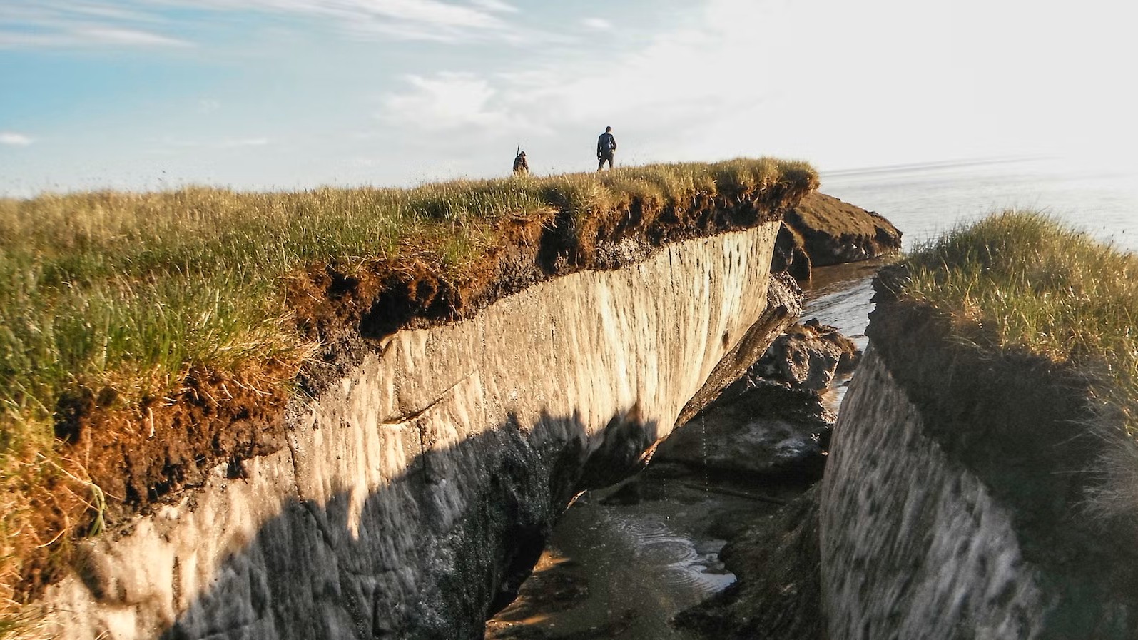 A large channel in the permafrost in Alaska where it has melted.
