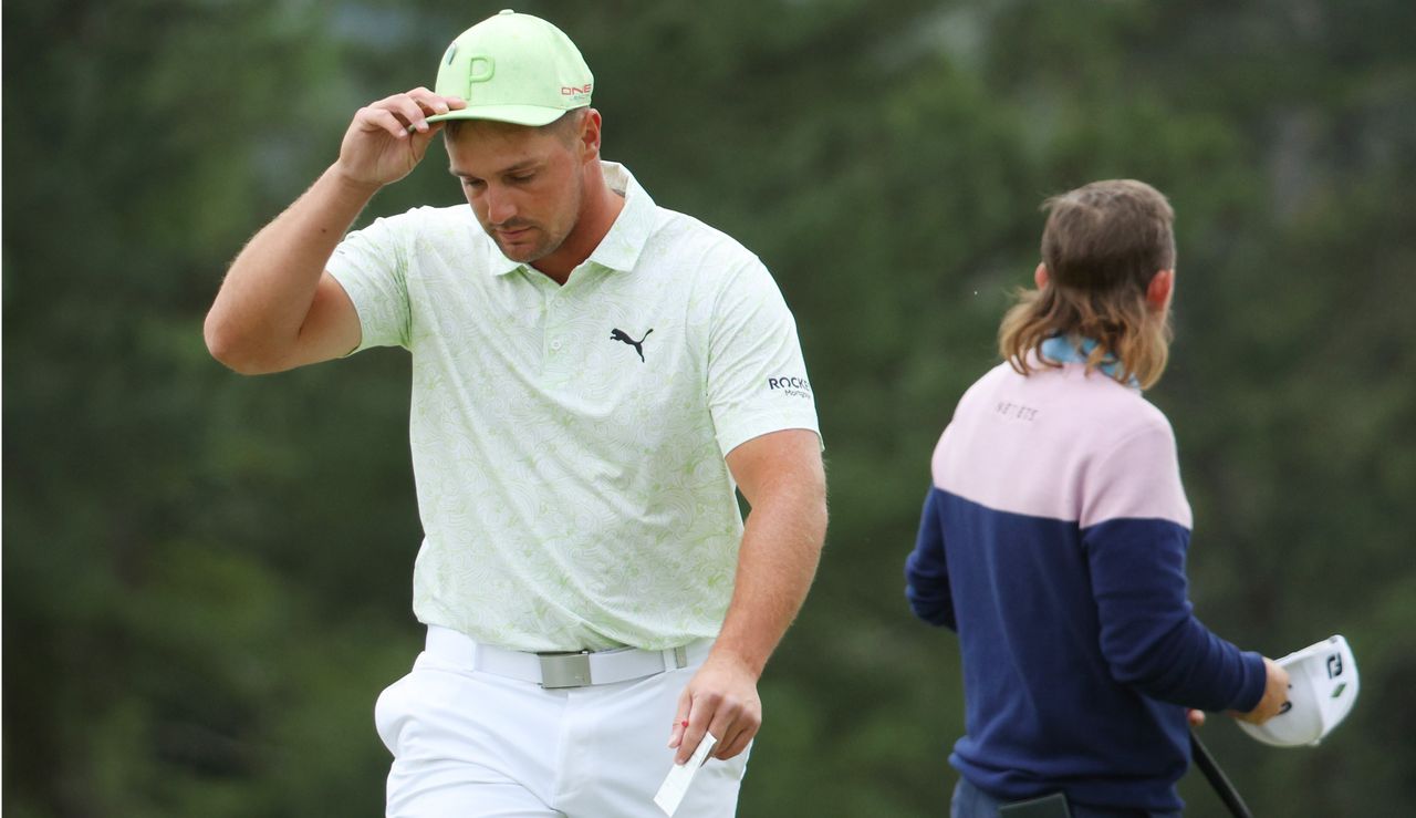 Bryson taps his cap