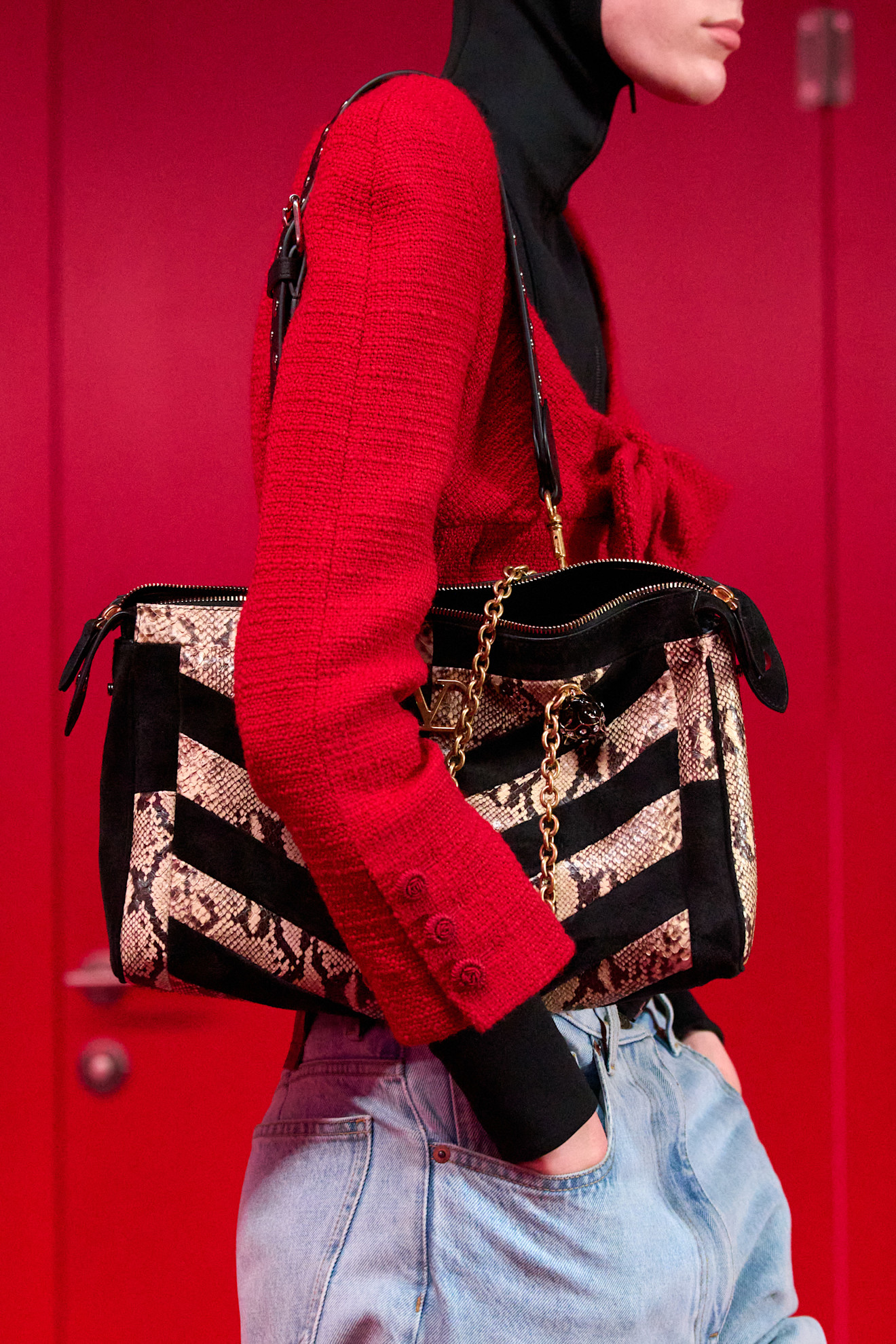 A model carried Rihanna's snakeskin bag on the Valentino runway