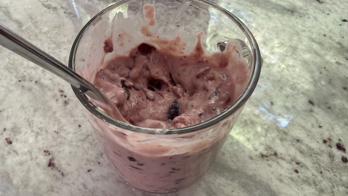 Ninja CrushBOSS making cherry frozen yogurt
