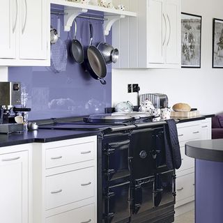 kitchen with purple box wall and black electric range cooker