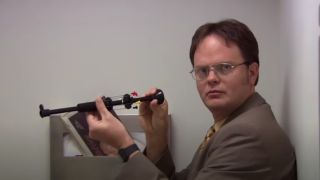 Dwight shows the camera his blowdart