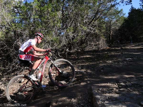 Max Plaxton (Specialized) with the race lead on a fire road