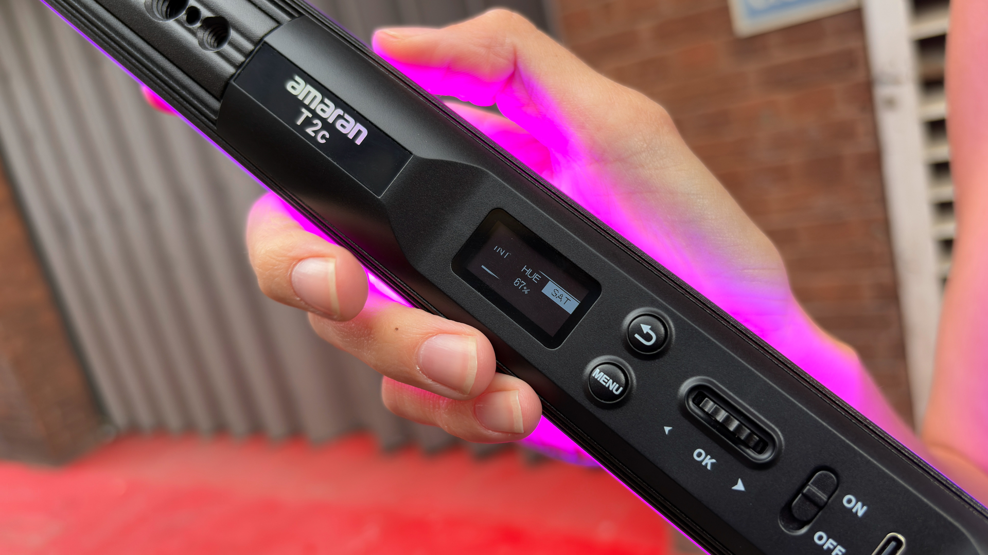 Amaran T2c: The metal shaft of the Amaran T2C features an OLED screen that enables you to use the adjacent dials and buttons to adjust properties such as Hue, Saturation, and Intensity.