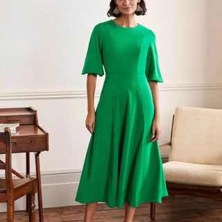 green dress with full skirt