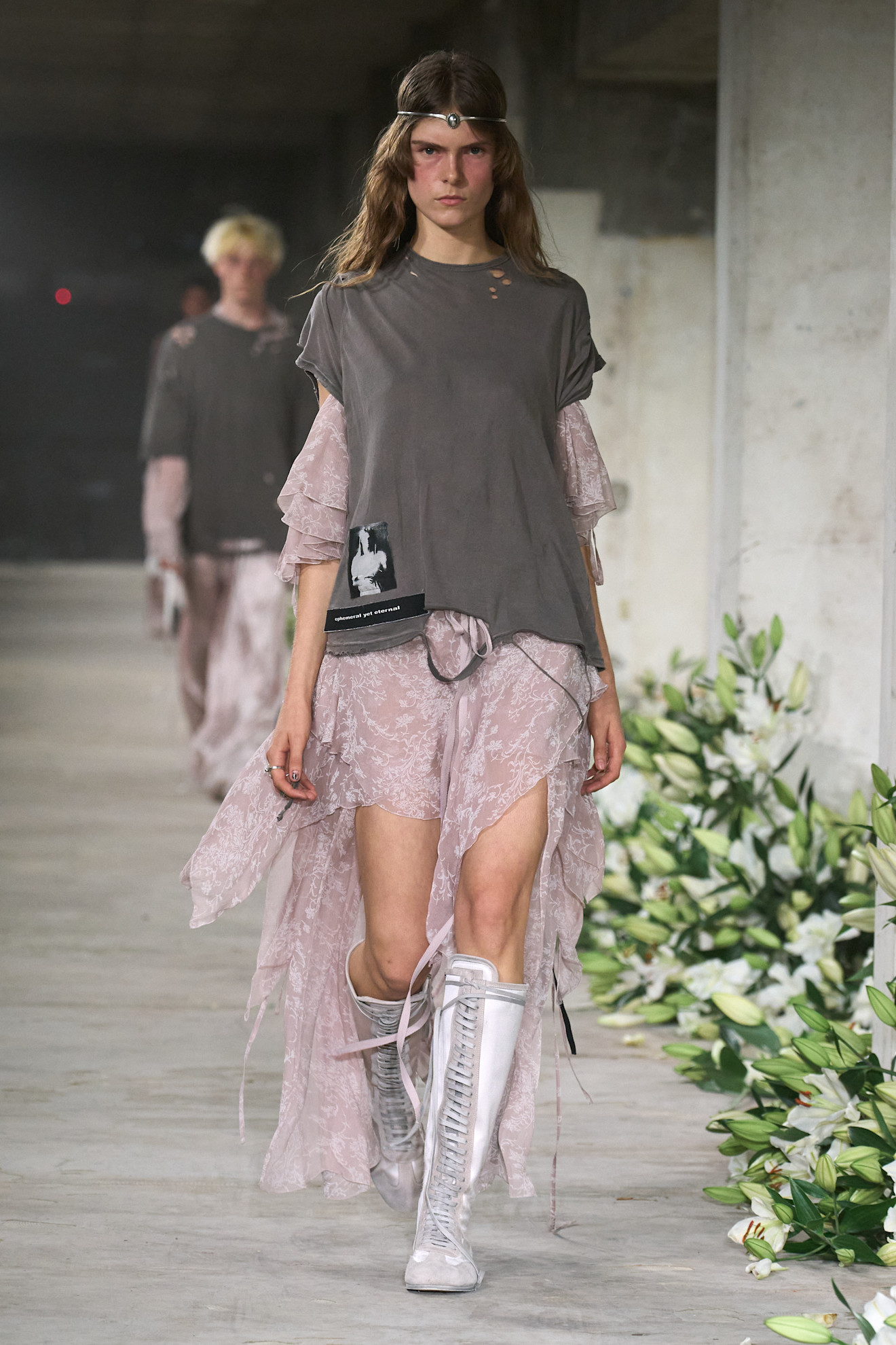 Later in the show, Lola's lace-up boxing shoes appeared on the runway.