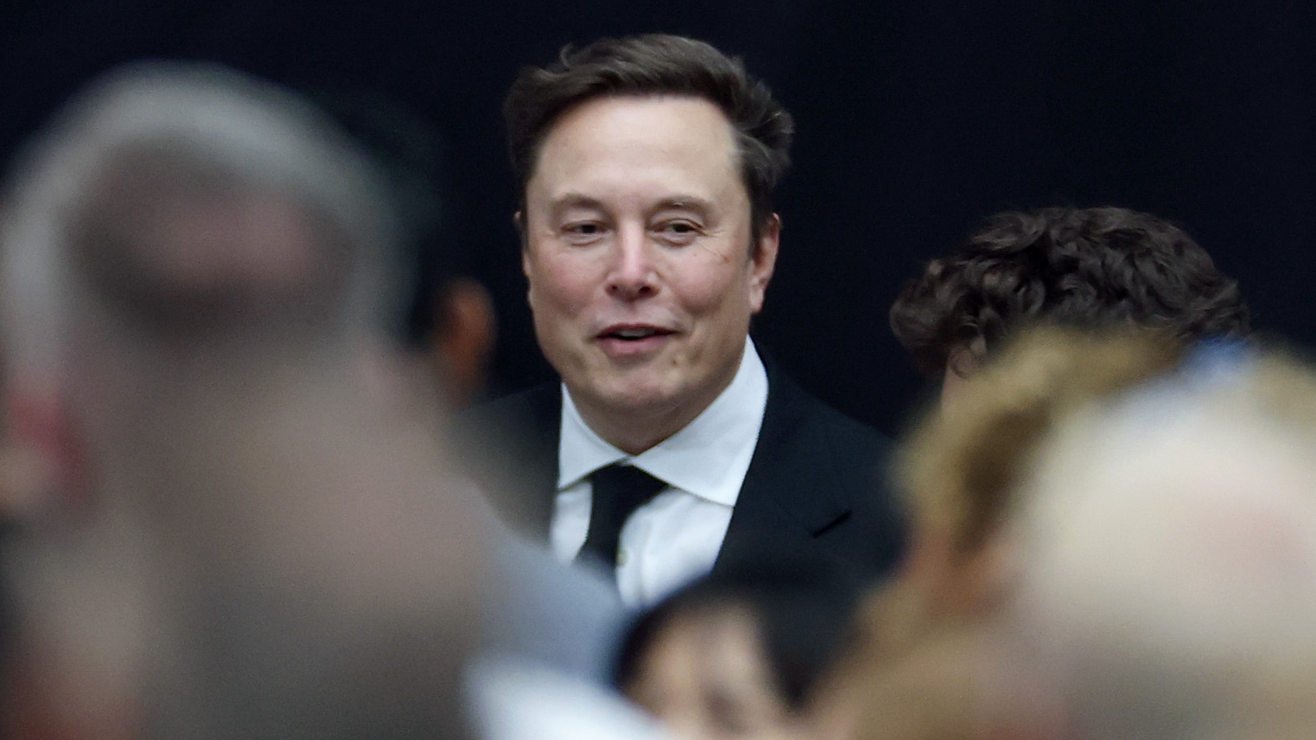 GLENDALE, ARIZONA - SEPTEMBER 21: Tesla CEO Elon Musk attends the memorial service for political activist Charlie Kirk at State Farm Stadium on September 21, 2025 in Glendale, Arizona. Kirk, the CEO and co-founder of Turning Point USA, was shot and killed on September 10th while speaking at an event during his &quot;American Comeback Tour&quot; at Utah Valley University. (Photo by Joe Raedle/Getty Images)