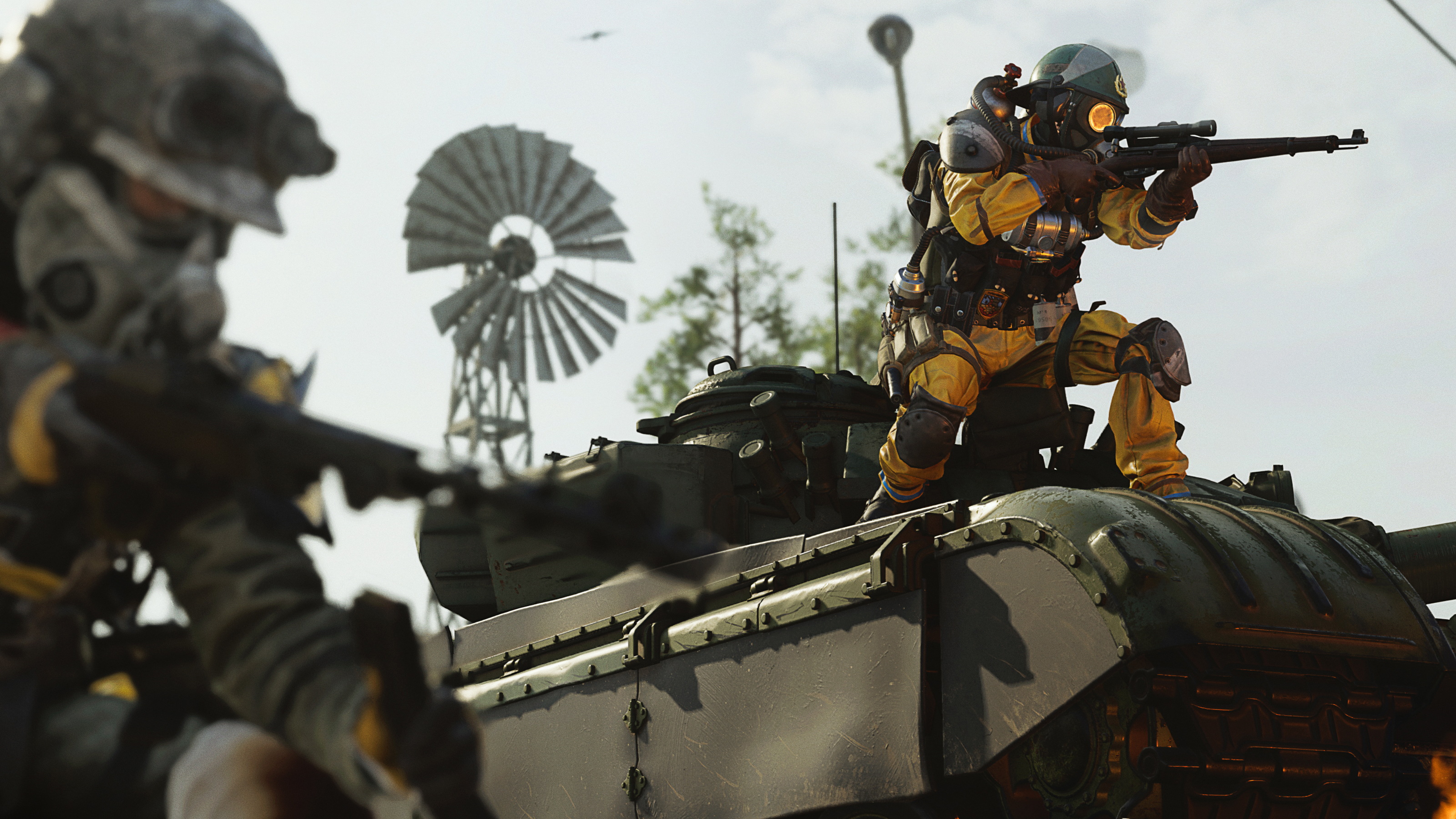 Call of Duty: Warzone Season 5 - Warzone operators battle atop a tank.
