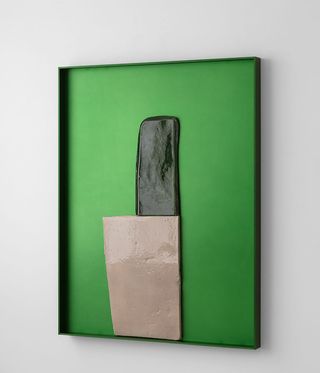 Abstract bas-relief by Ronan Bouroullec mounted on a green background and frame made of anodyzed aluminium