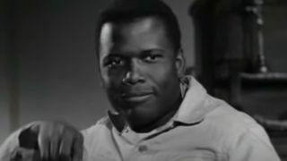 Sidney Poitier getting ready to build a chapel for some nuns in Lilies of the Field