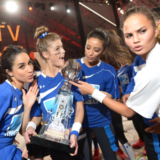 Meghan Markle, Nina Agdal, Shay Mitchell and Chrissy Teigen participate in the DirecTV Beach Bowl at Pier 40 on February 1, 2014 in New York City.