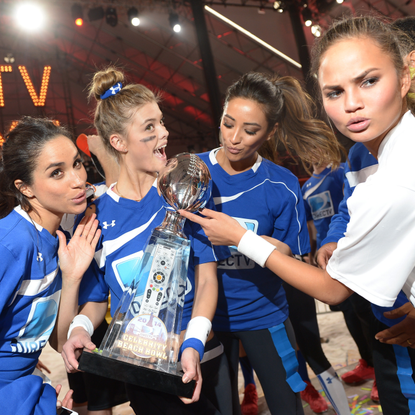 Meghan Markle, Nina Agdal, Shay Mitchell and Chrissy Teigen participate in the DirecTV Beach Bowl at Pier 40 on February 1, 2014 in New York City.