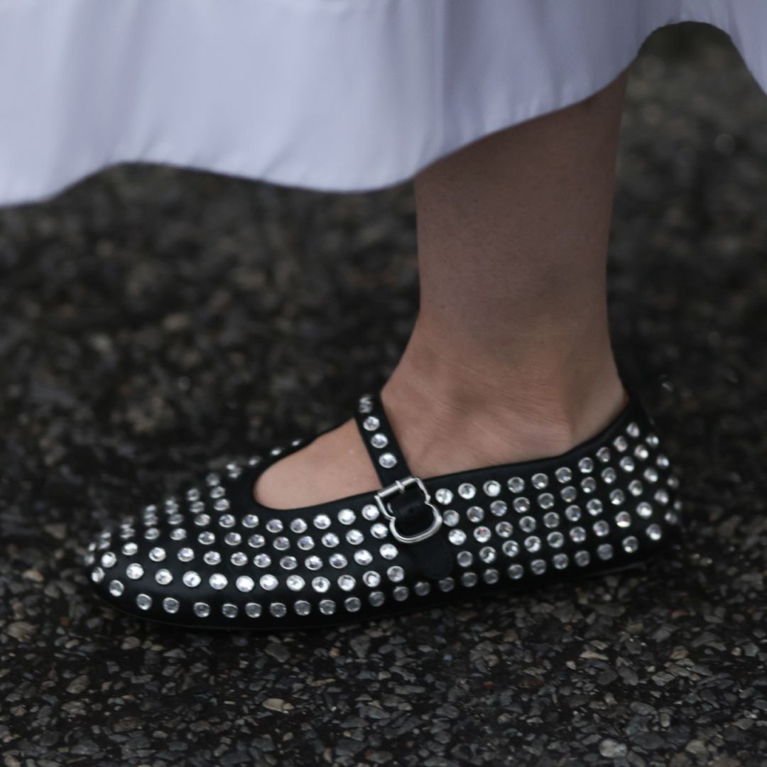 Woman wears ballet flats on the street