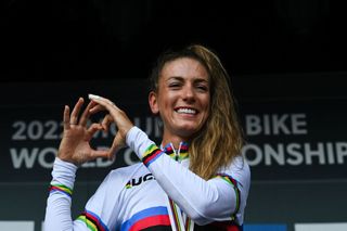 French cyclist Pauline Ferrand Prevot celebrates on the podium after winning the womens elite olympic crosscountry event at the UCI Mountain Bike World Championships 2022 in Les Gets southeastern France on August 28 2022 Photo by OLIVIER CHASSIGNOLE AFP Photo by OLIVIER CHASSIGNOLEAFP via Getty Images