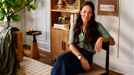 Joanna Gaines sitting in a chair 