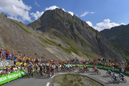 The 2019 Tour de France peloton nears the summit of the Col du Tourmalet.
