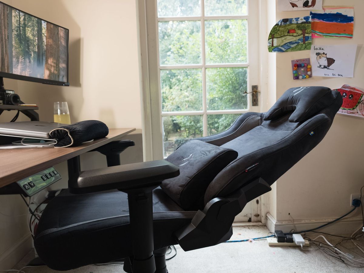 Arozzi Vernazza Supersoft gaming office chair in a home office room in its fully reclined position