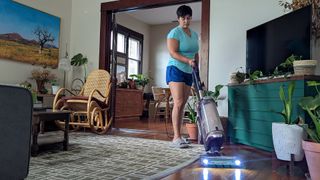 Shark PowerDetect Upright vacuum in use