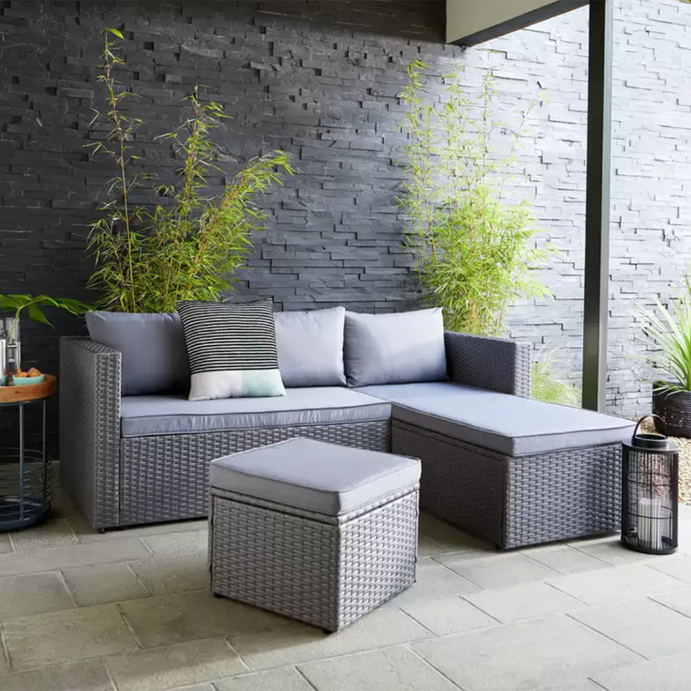 gret rattan corner sofa on a covered patio