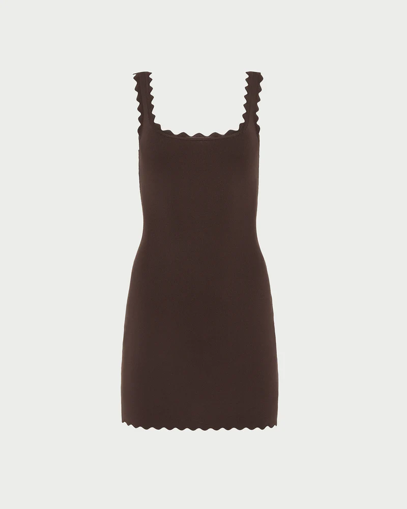 Brown mini dress with scallop neckline, hemline, and straps.