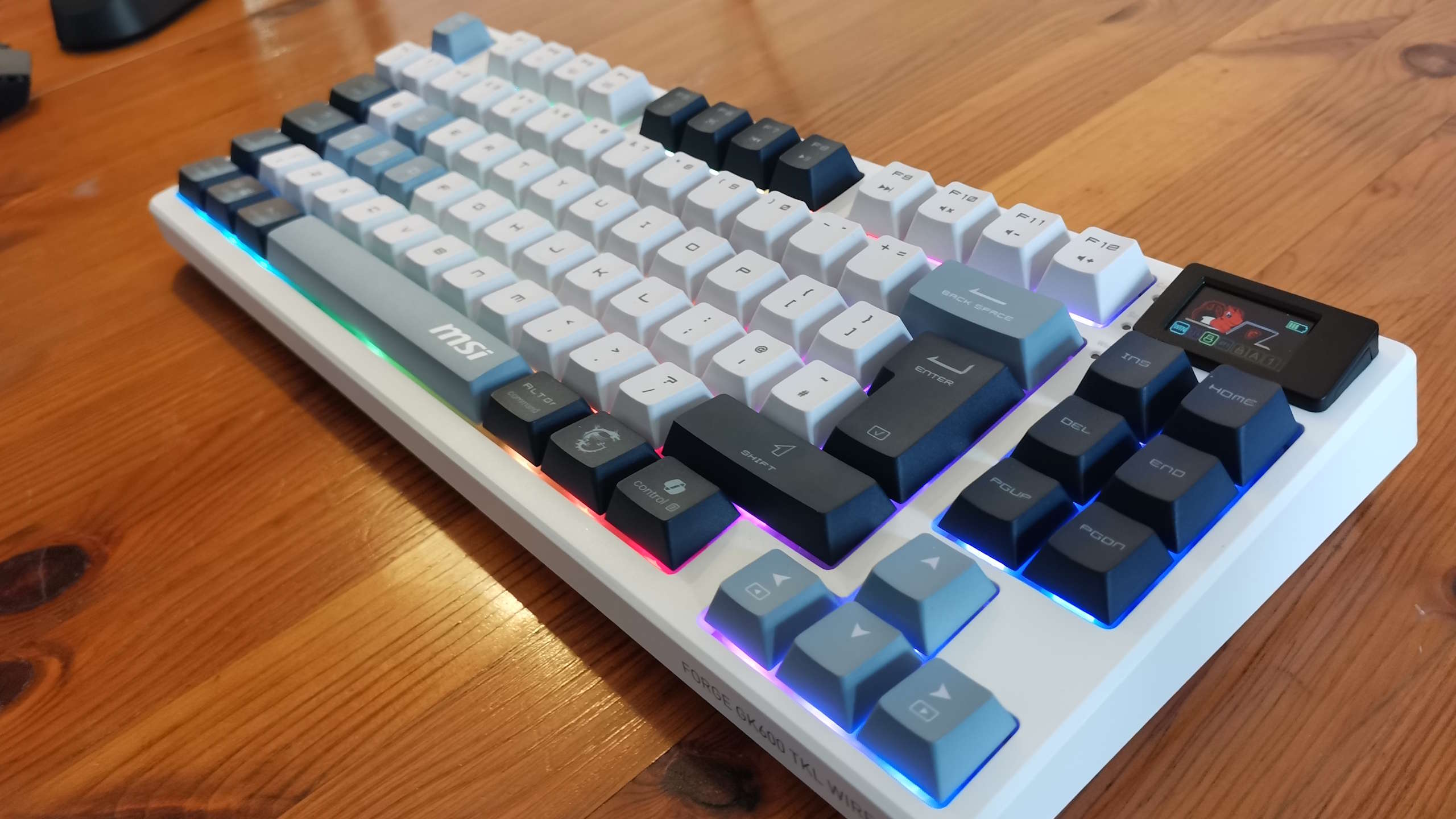 MSI Forge GK600 TKL gaming keyboard on a desk.