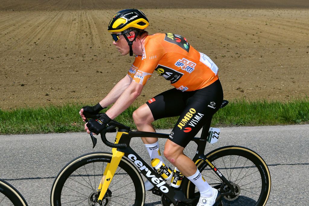 ROMONT SWITZERLAND APRIL 27 Rohan Dennis of Australia and Team Jumbo Visma orange points jersey competes during the 75th Tour De Romandie 2022 Stage 1 a 178km stage from La Grande Beroche to Romont 777m TDR2022 on April 27 2022 in Romont Switzerland Photo by Dario BelingheriGetty Images