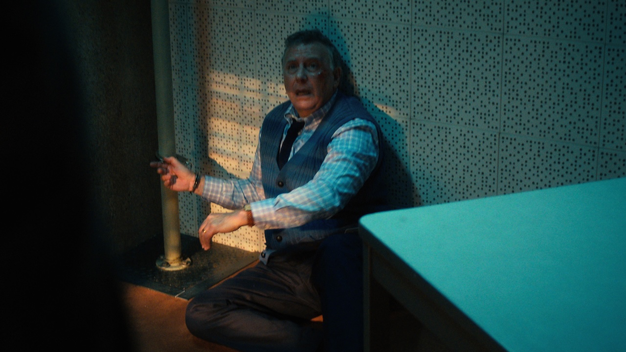 Dr. Owens handcuffed to a pipe in Stranger Things Season 4