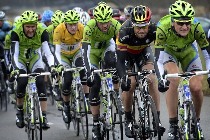 Ted King (Cannondale) sets the pace in the peloton with Belgian champion Tom Boonen (Omega Pharma-Quick Step) on his wheel.