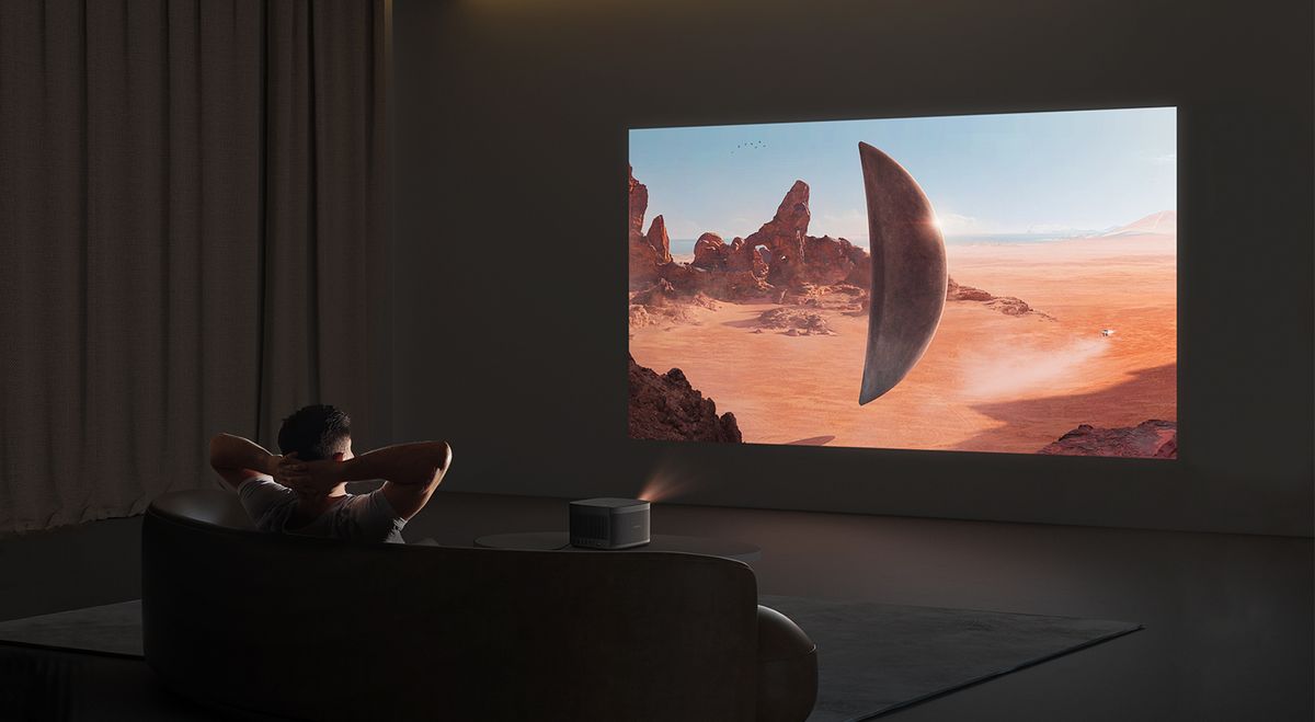 XGIMI Horizon Pro playing movie on a living room wall