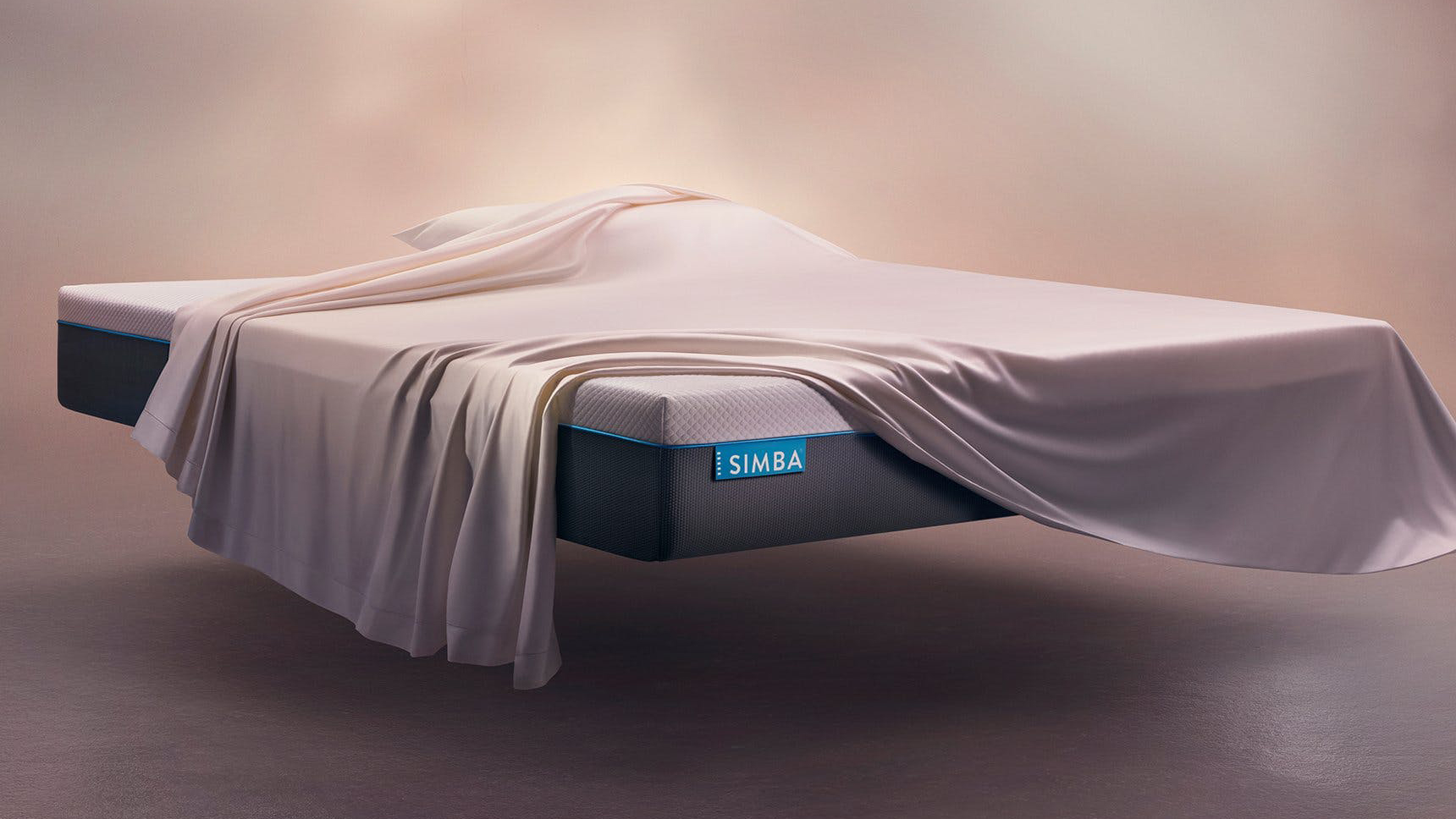 Simba Hybrid Mattress with a pillow and sheet over the bed