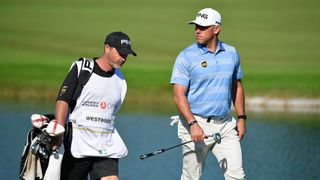 Lee Westood of England speaks with caddie Billy Foster during Day Four of the Turkish Airlines Open at Regnum Carya Golf & Spa Resort on November 4, 2018
