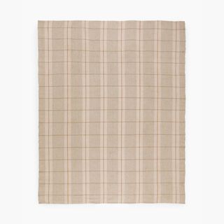 neutral grid patterned rug