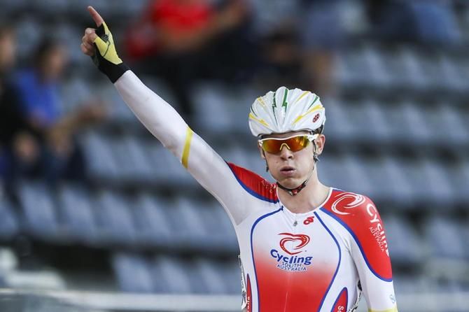 Alex Edmondson salutes the crowd after a hard fought win in the points race.