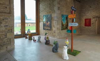 A trail of resin gnomes (which Ozbolt smuggled back from Serbia) charges through the gallery