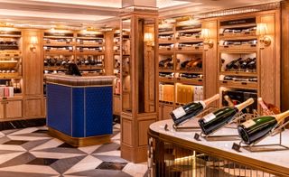 Cabinets displaying a wide collection of wines at the newly refurbished Harrods Wine Rooms