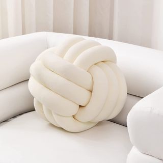 White knotted pillow