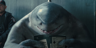 King Shark reading a book