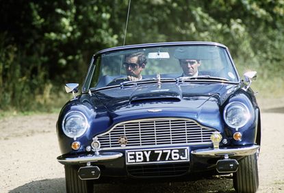 The King driving his blue DB6 Series II