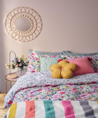 Women's bedroom idea with mirror, printed floral duvet by George Home