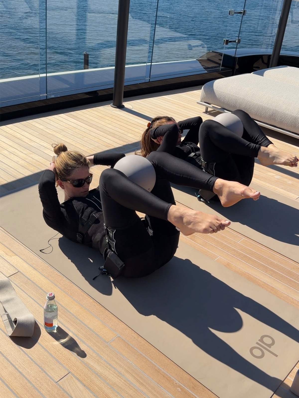 Eliza Huber and Kaelie Kelleher doing EMS training on the Alo yacht.