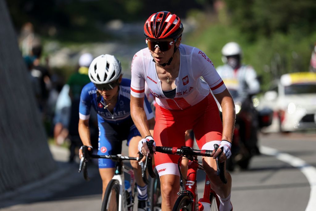 Polands Anna Plichta R and Israels Omer Shapira ride in a breakaway group as they lead the womens cycling road race of the Tokyo 2020 Olympic Games finishing at the Fuji International Speedway in Oyama Japan on July 25 2021 Photo by MICHAEL STEELE various sources AFP Photo by MICHAEL STEELEAFP via Getty Images