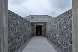 Entering the round building at the The Chuan malt whisky distillery by Neri and Hu