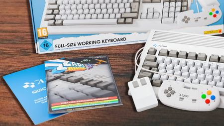 A1200 Amiga microcomputer remake next to box and copy of Zzap! Amiga magazine.