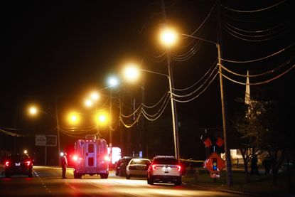 Police operate at a crime scene outside the Cameo Nightclub after a reported fatal shooting, Sunday, March 26, 2017, in Cincinnati. 