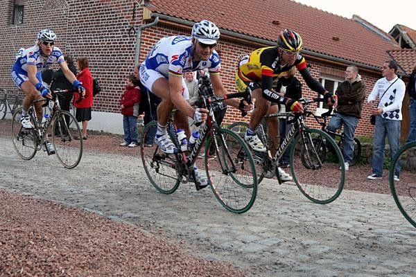 Quick Step power from left to right with Wouter Weylandt, Tom Boonen and Stijn Devolder.